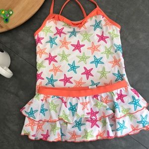 Two piece bathing suit with skirt bottom